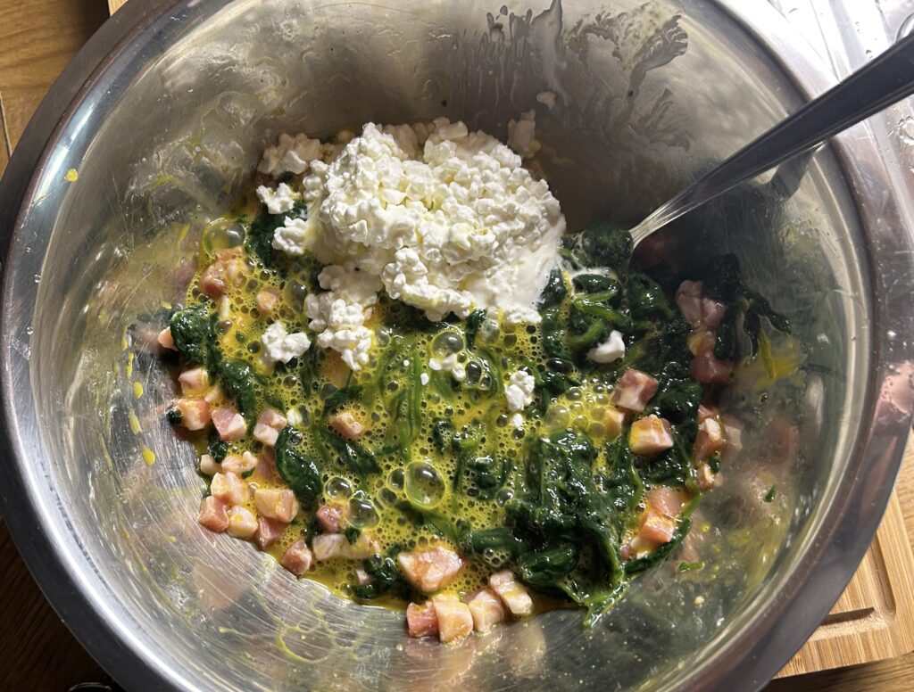 spinach, sweet bacon cubes, eggs and cottage cheese